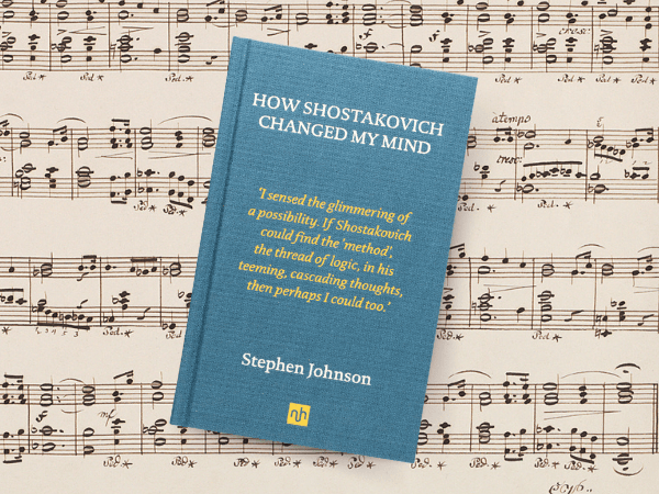 A copy of How Shostakovich Changed My Mind on a background of music sheets